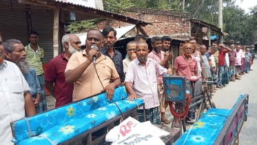 বগুড়া সদরের যশোপাড়া বন্দরে ব্যবসায়ীর ওপর হামলা ও লুটপাটের বিরুদ্ধ